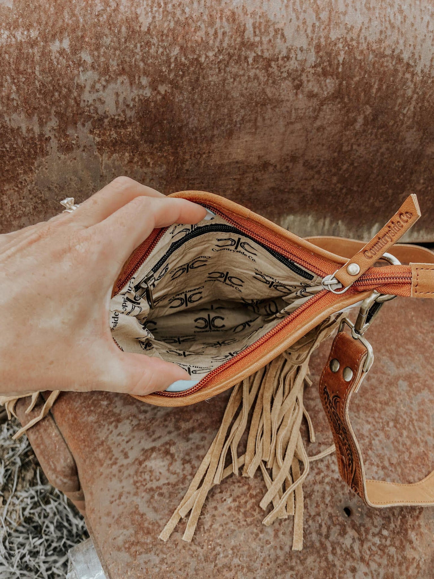 Checkered Cowhide Fringe Purse